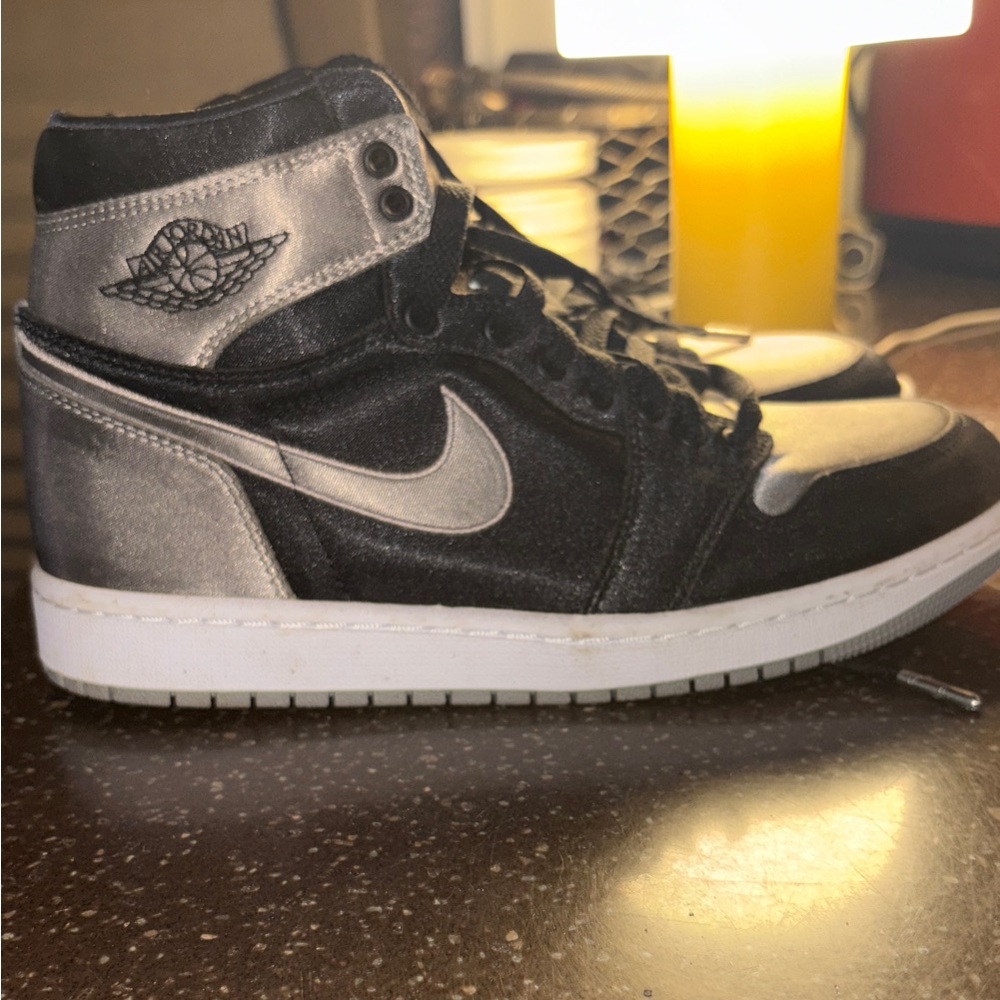 Jordan Women's Black and Silver High-Top Sneakers